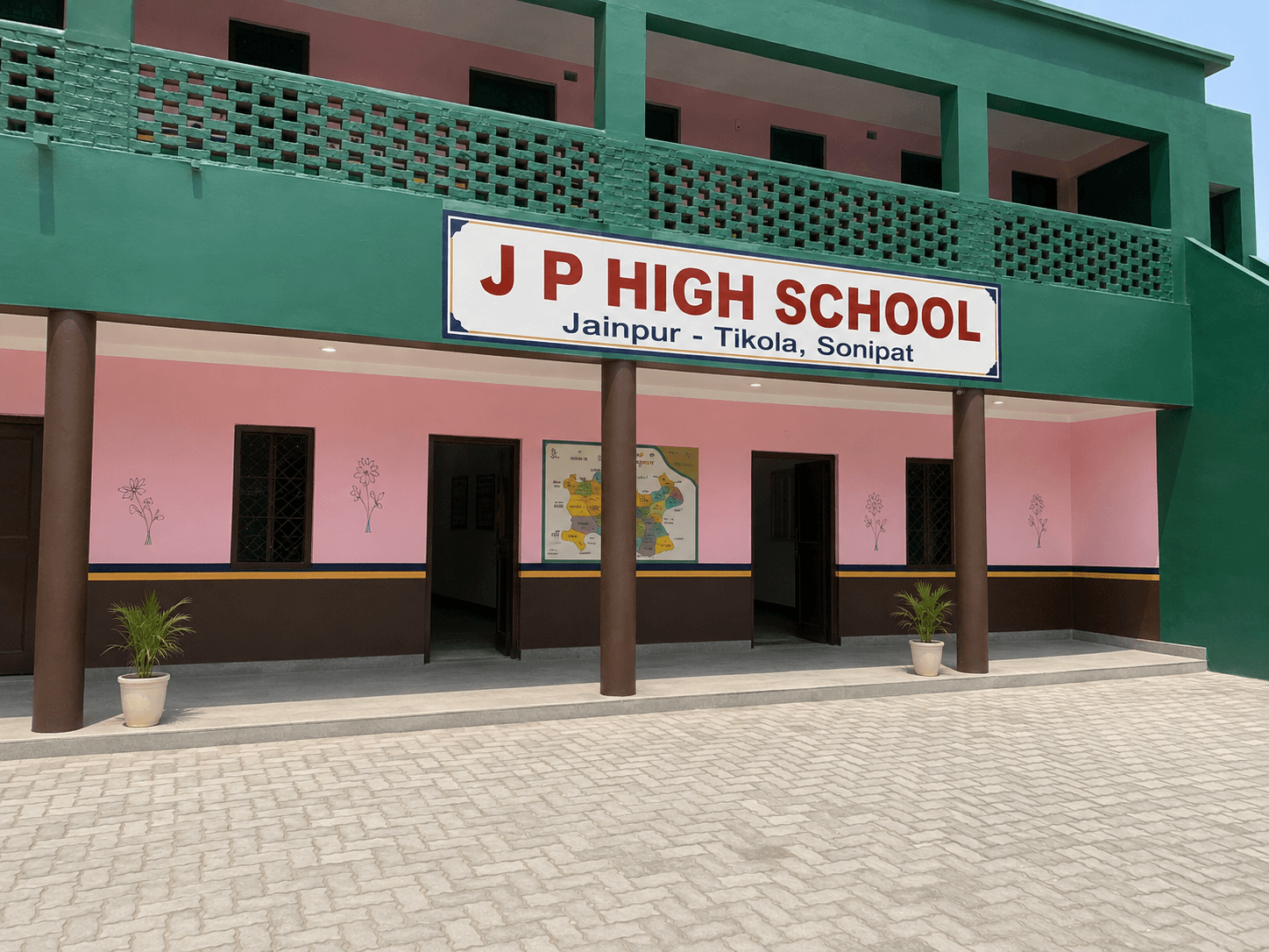 J P High School courtyard and entrance